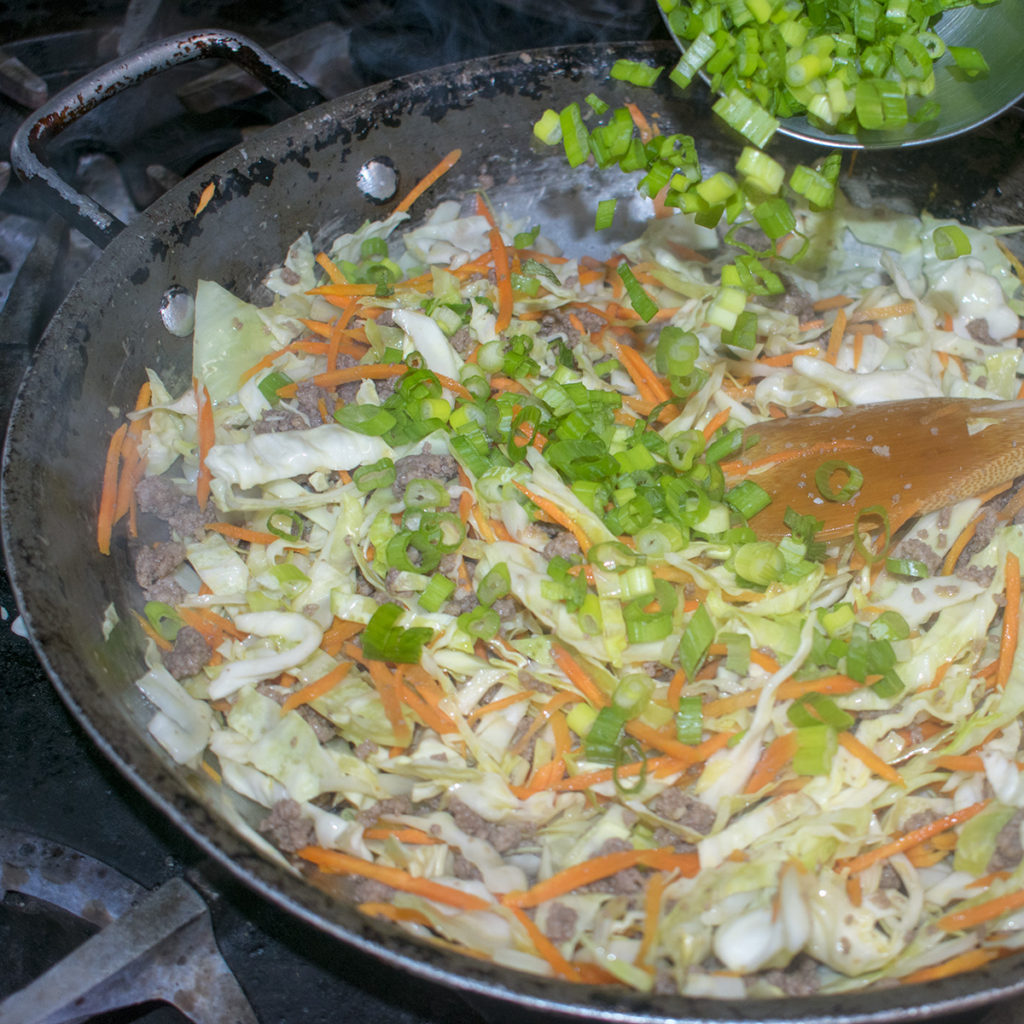 Stir in the green onions