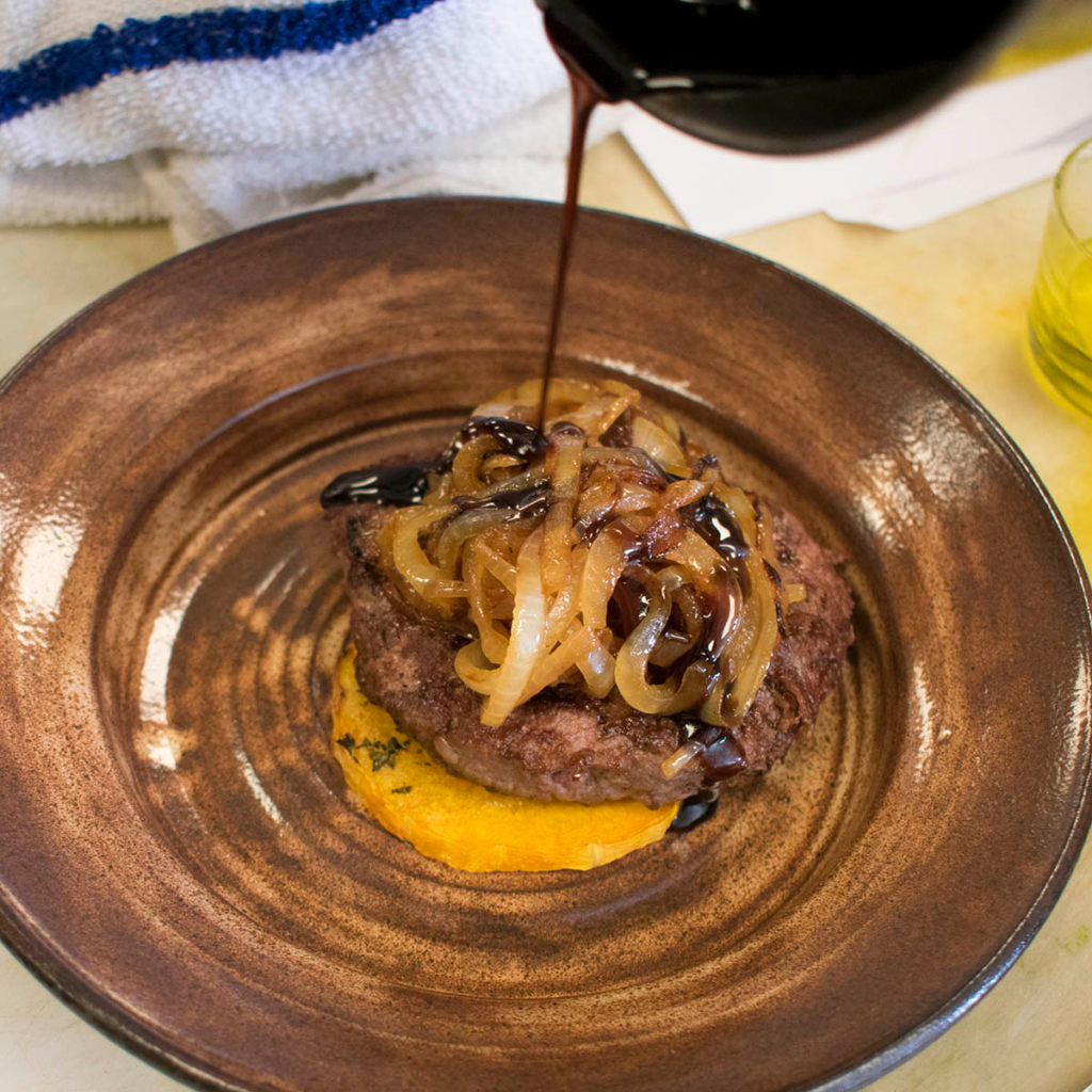 Drizzle the balsamic reduction on top