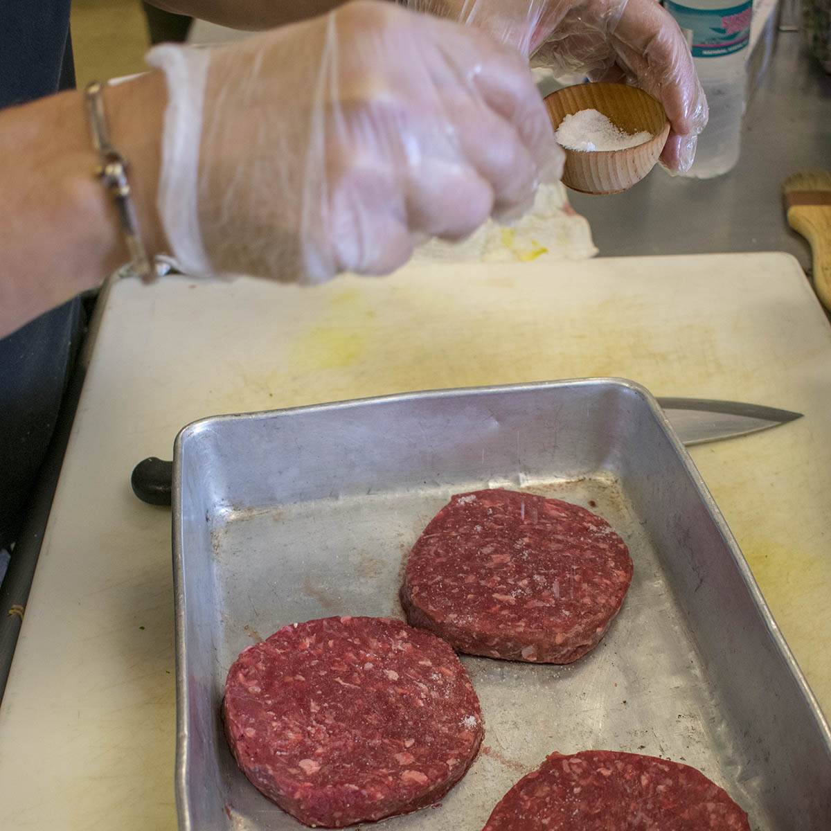 Split the yak meat into 6 oz portions, form patties and season with sea salt