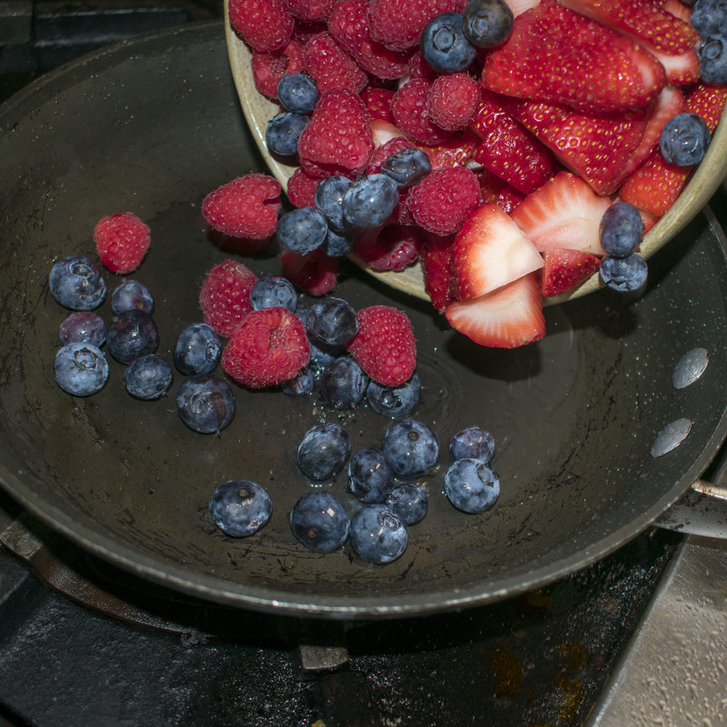 Add mixed berries to a saucepan