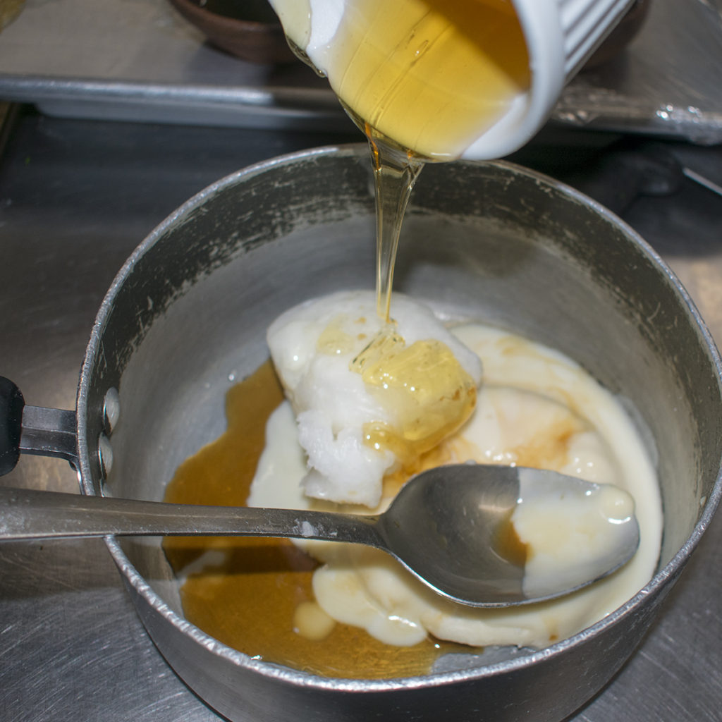 Add honey into the saucepan and heat