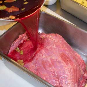 Pour the cold brine over the meat