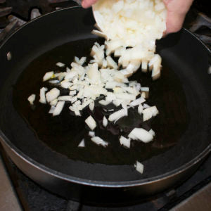 heat oil in large skilled over medium heat and add onion