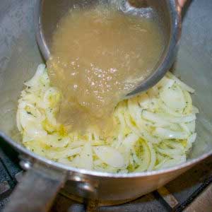 Add onions to a saucepan