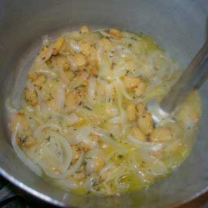Add chicken stock and stir