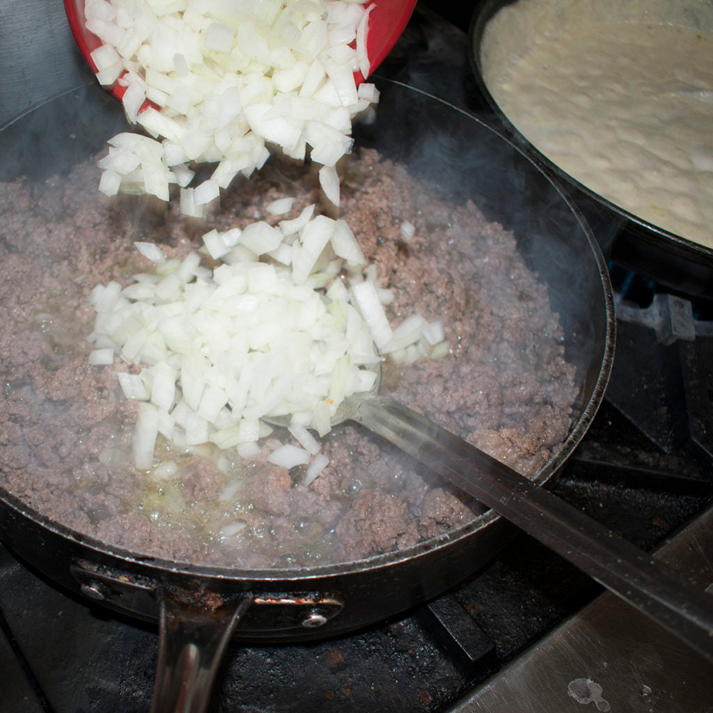 About halfway through, add the onions