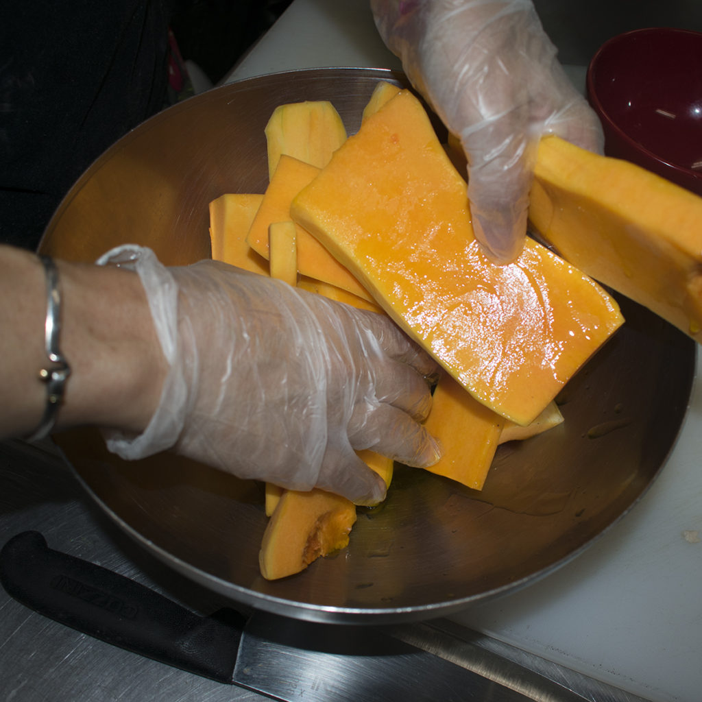 Slice the squash lengthwise into ¼” sheets and brush them with olive oil