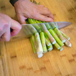 Trim off tough ends of asparagus spears