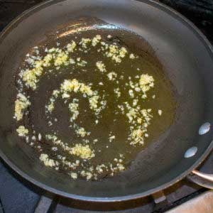 Add garlic and oil to cooking pan