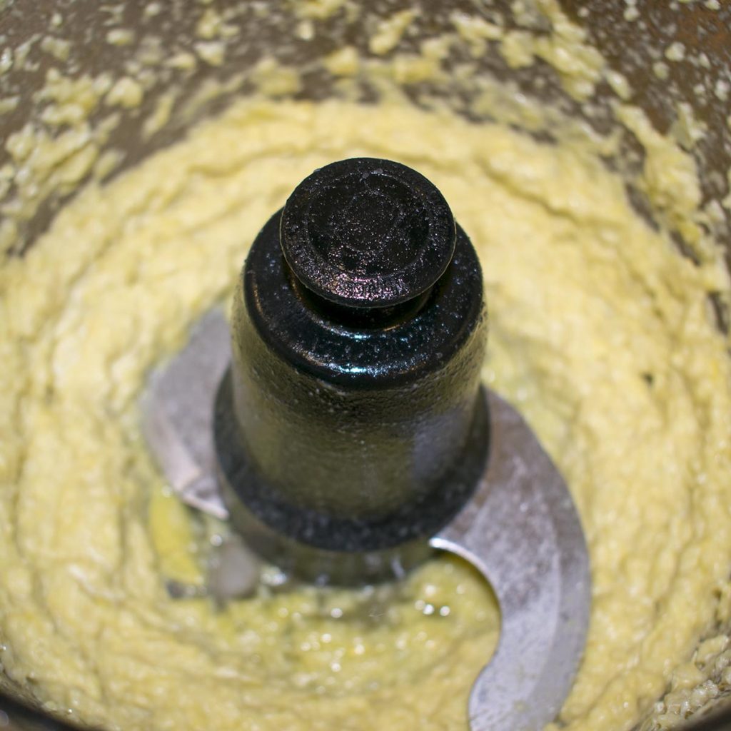 pulse all ingredients in the food processor until the hummus is thoroughly combined and creamy