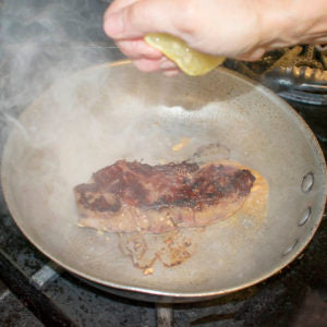 Add the lemon juice to the pan