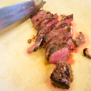Slice the yak steak