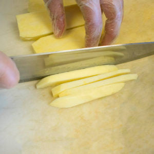 Cut potatoes into matchstick French fries