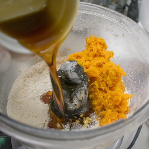Pour in maple syurp to AIP Maple Bacon Sweet Potato Biscuits