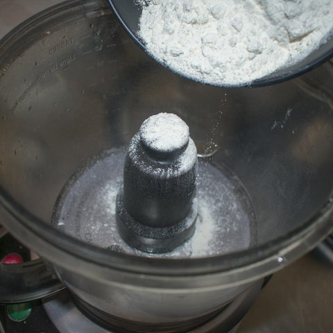 Pour flour into the food processor