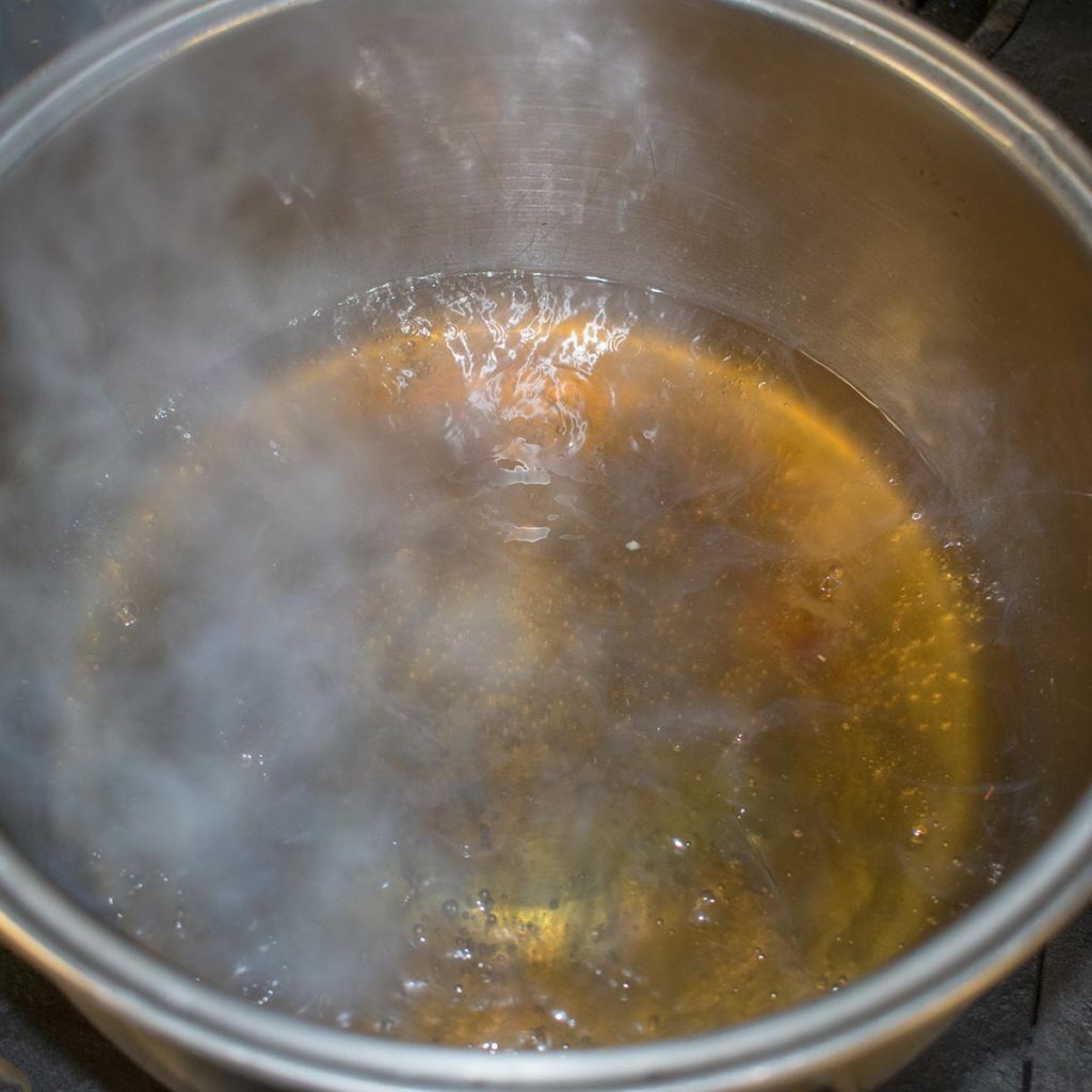 Simmer until the sugar has dissolved