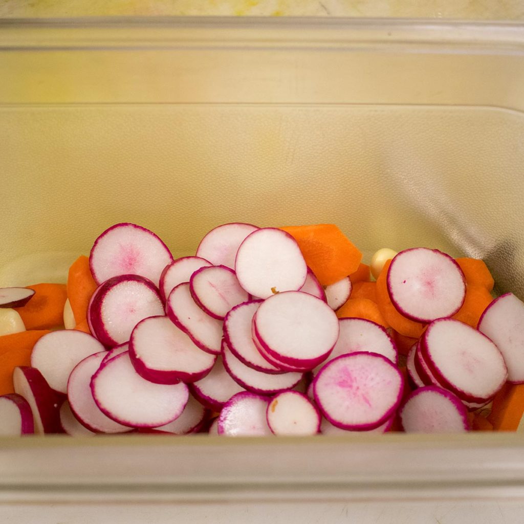 Add radishes to the jar