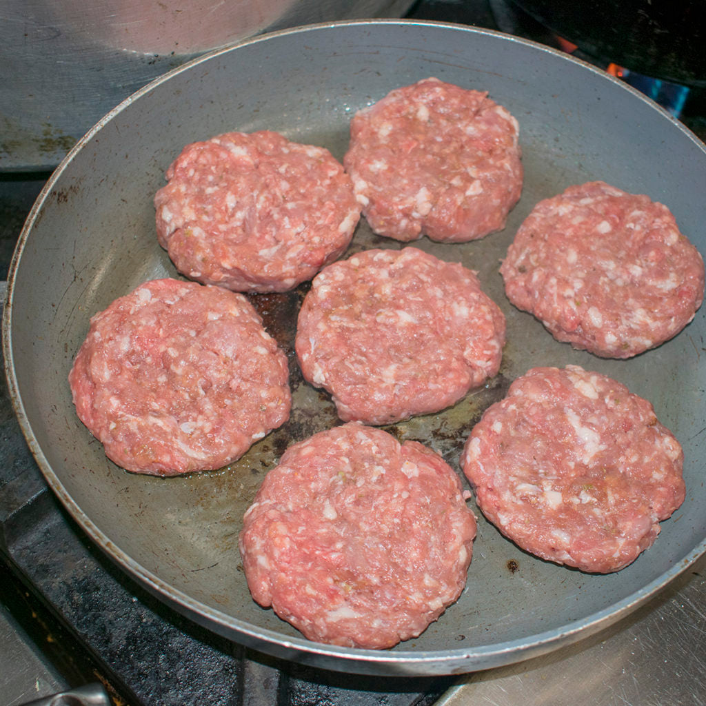 Fry the AIP Brats in a little bacon fat or lard in a skillet