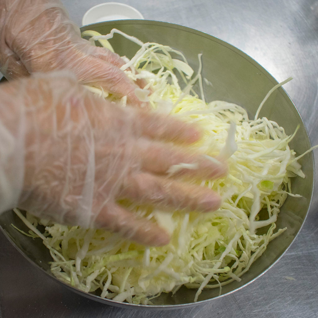 Combine the salt and cabbage with your hands