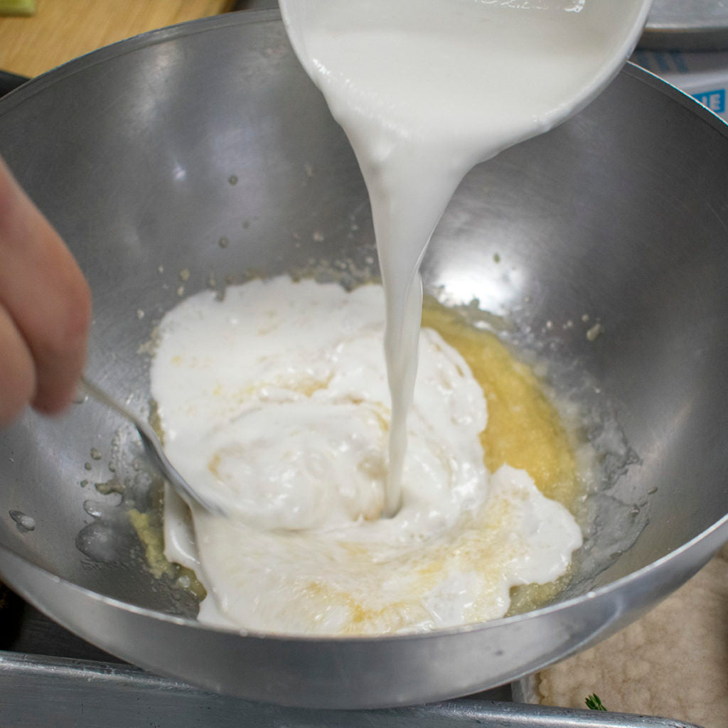 Pour in coconut milk