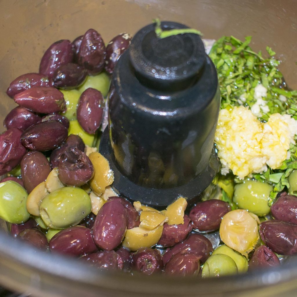 Add all AIP Olive Tapenade ingredients to the food processor