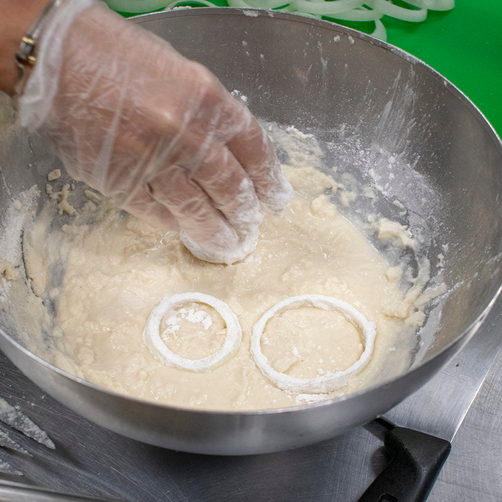 continue to dip aip onion rings separately into batter