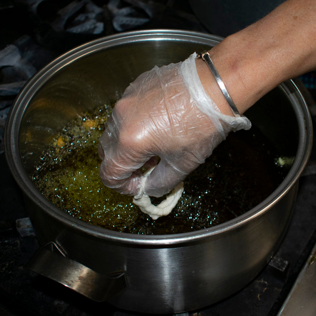 gently place aip onion rings into hot oil