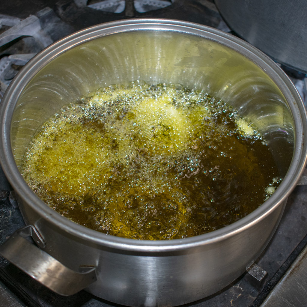 turn aip onion rings occasionally with tongs