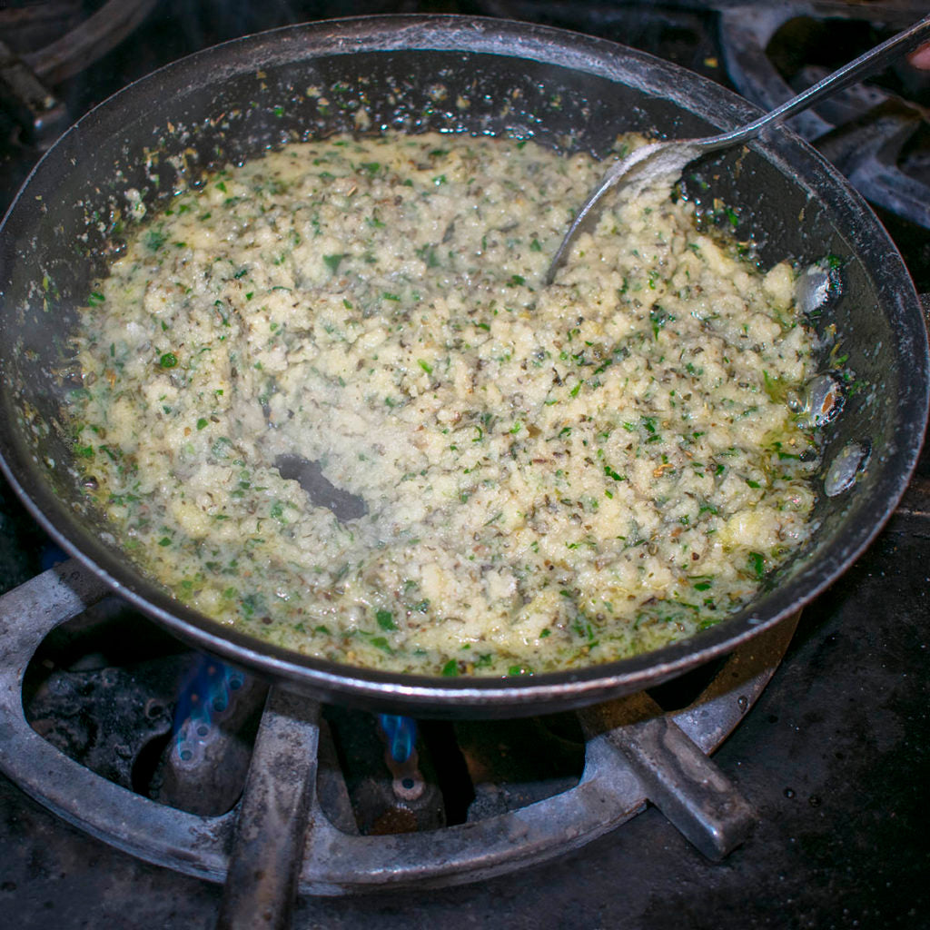 Continue to stir until a soft puree is formed.