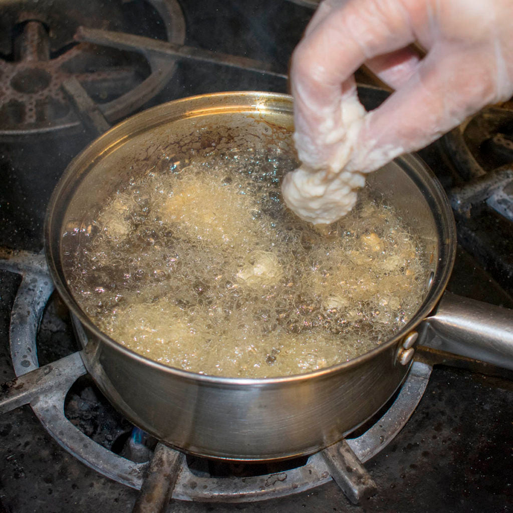 Fry until golden brown. Remove with a slotted spoon to paper towel lined plate