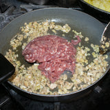 sautee chopped mushrooms and pork