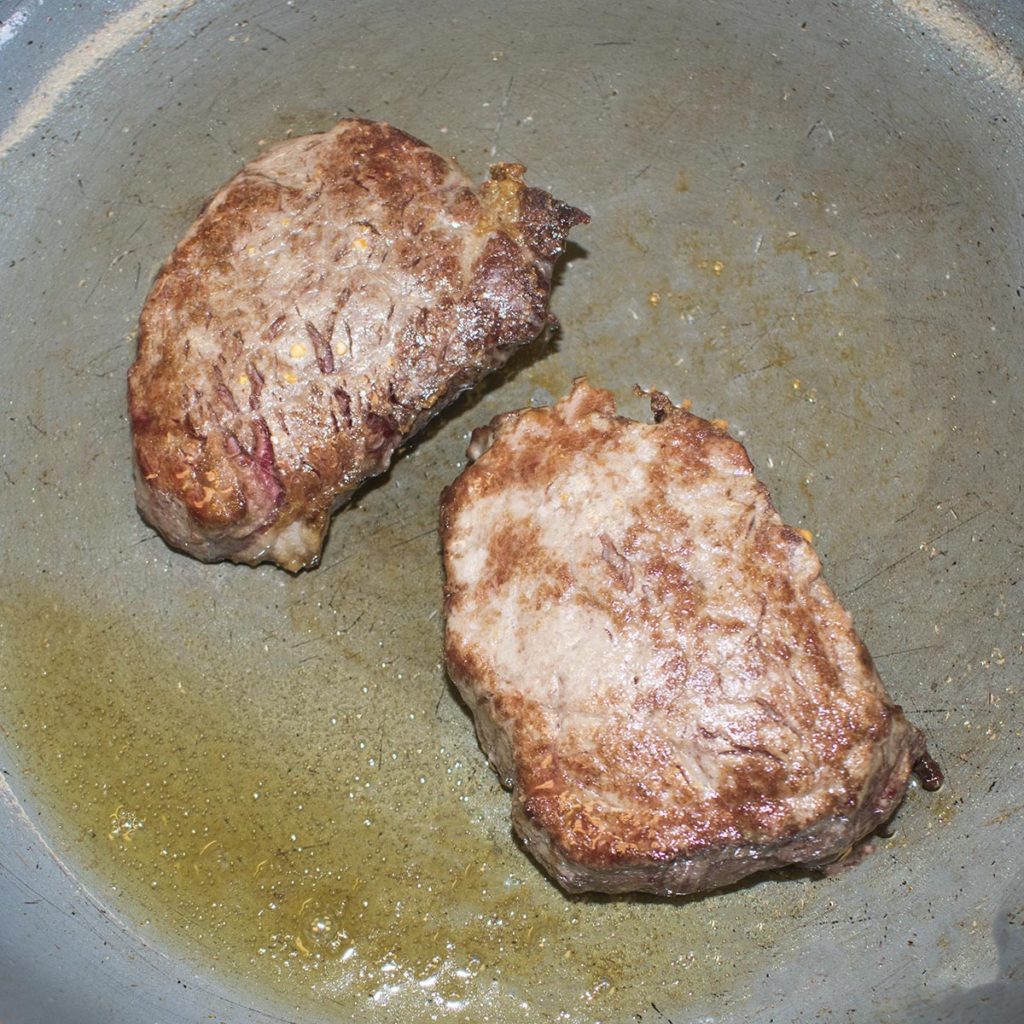 Season the beef tenderloin with sea salt on both sides. Heat an oven safe saute pan over a medium high heat and sear it turning once, then transfer to 400 oven and bake until 130 internal temperature (for medium rare), about 8-10 minutes. Check with thermometer. Remove pan from oven and set aside to let the meat rest.