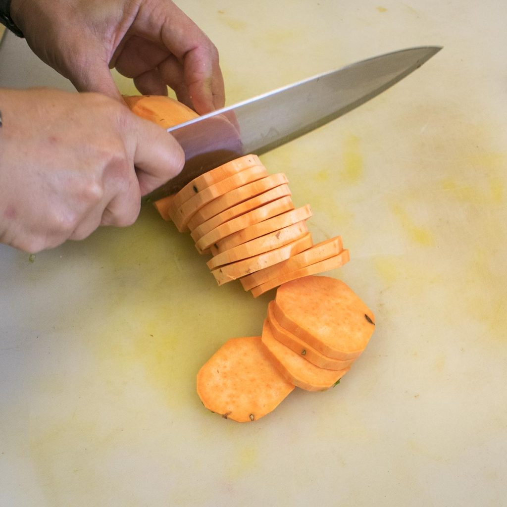 Peel and slice the sweet potatoes into ¼“ slices