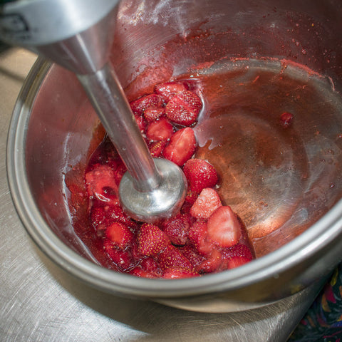 start pureeing the mixture with an immersion blender until smooth
