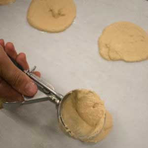 ladle batter out 1/4 cup at a time