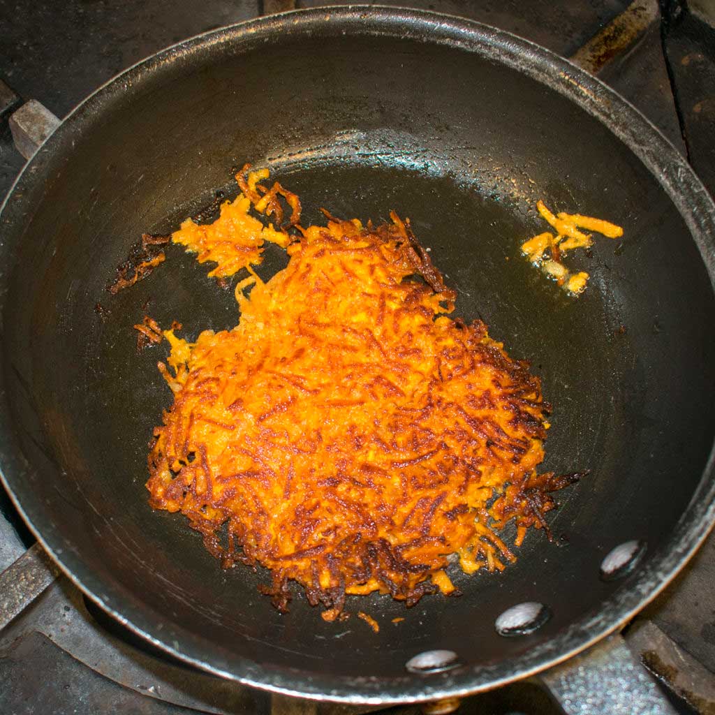 cook aip hashbrowns until golden brown