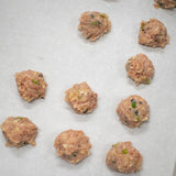 place balls on cooking sheet