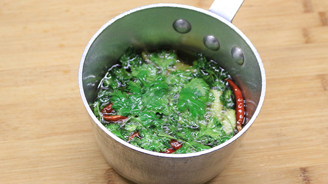 Heat all ingredients then let cool and jar