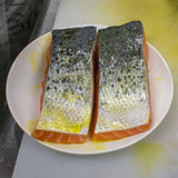 Two 5 oz pieces of skin-on fresh salmon filet