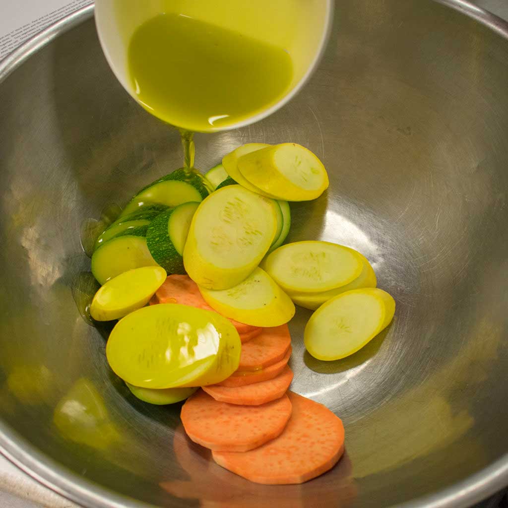 add olive oil to vegetables
