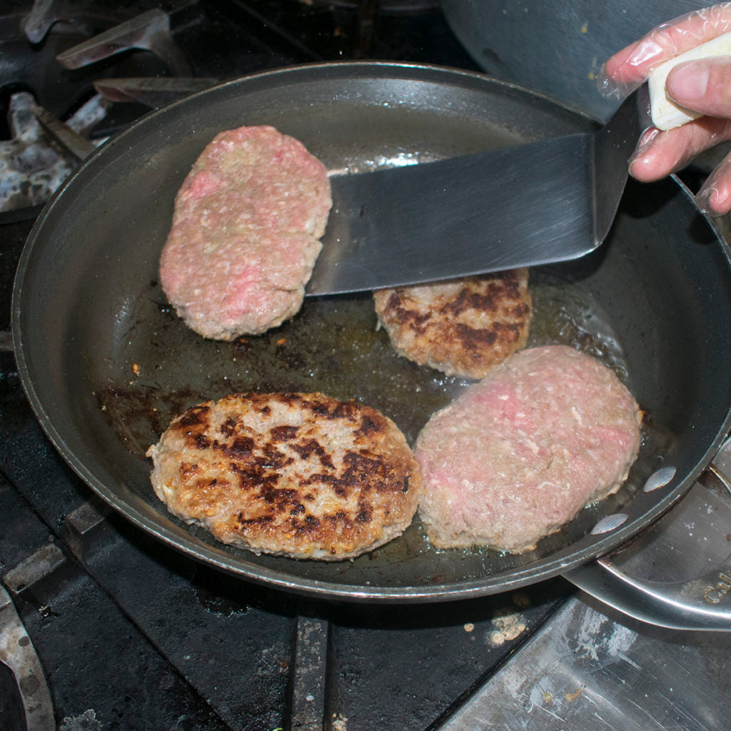 Add the patties to the pan and cook until browned, approximately 2-3 minutes