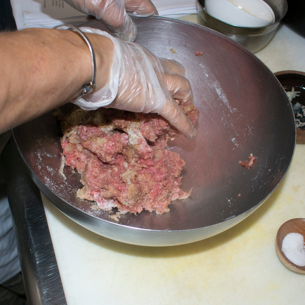 mix ingredients together with hands