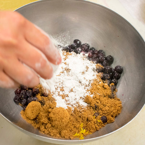 toss blueberries with coconut sugar and arrow root