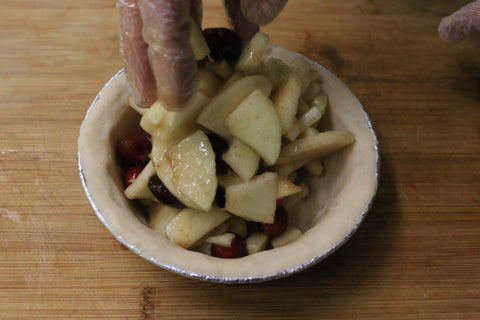 Fill pie shell with fruit filling