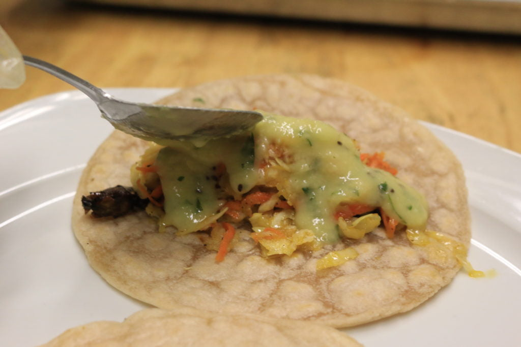 Top with cabbage and carrots and pour on AIP POTG Salsa Verde