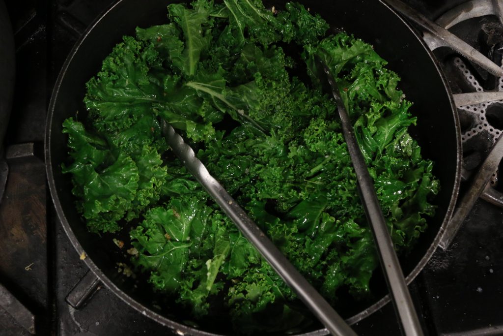 Add in kale and sauté