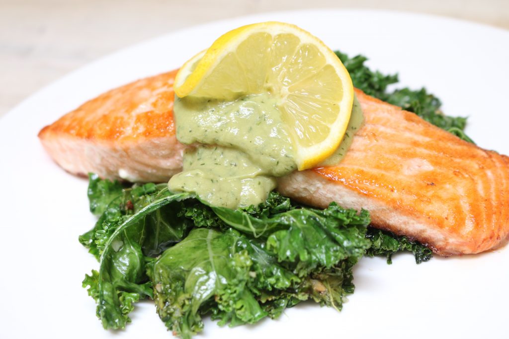 Paleo Grilled Salmon over Kale with Lemon Dill Sauce