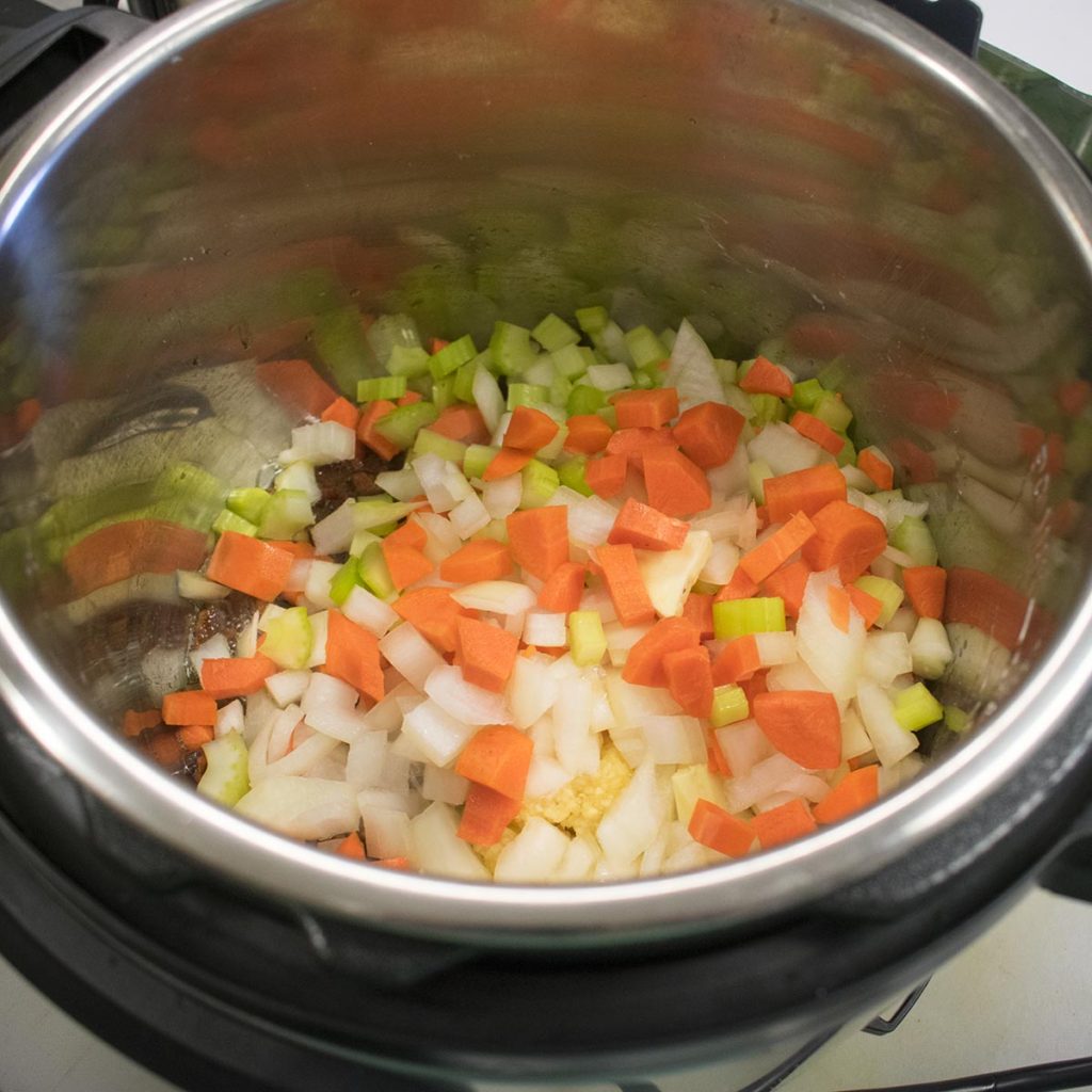 Add the onions, carrots, garlic and celery