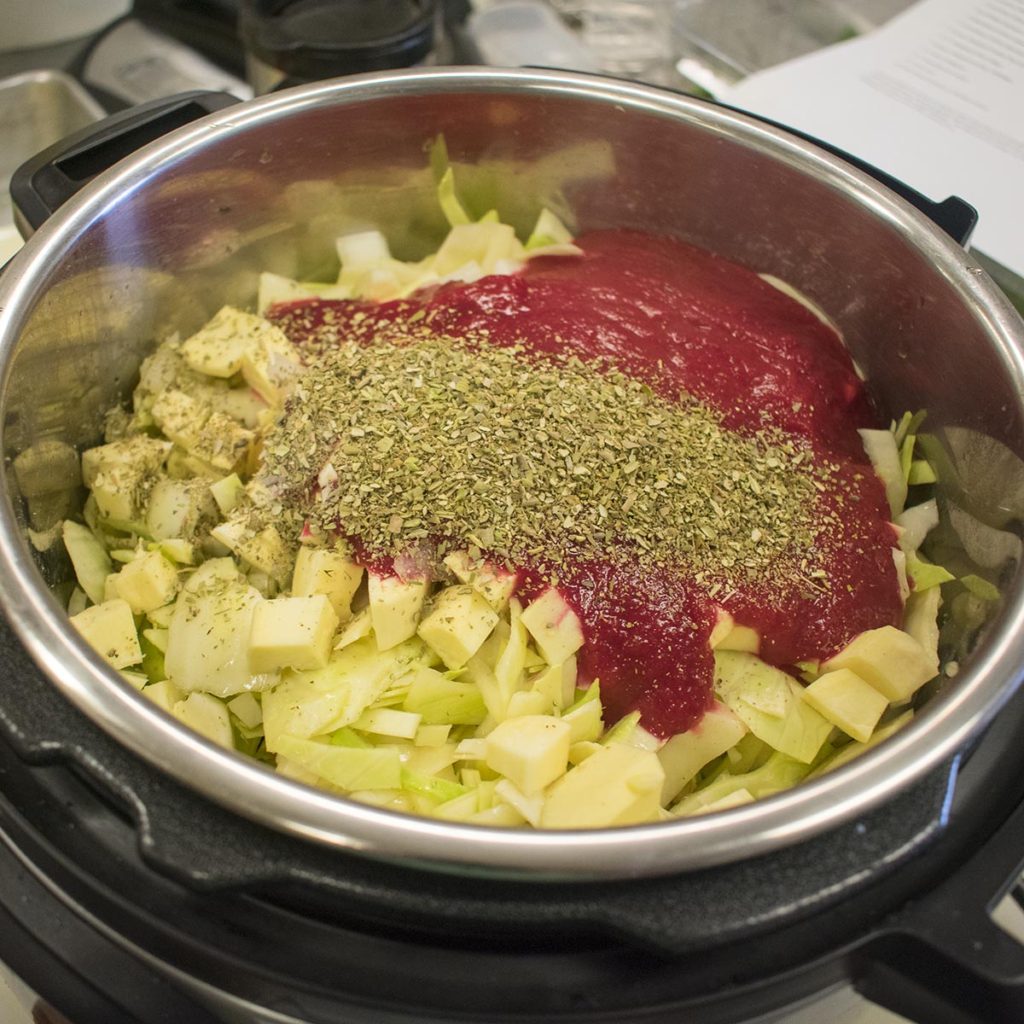 Top with spices and set the pot to soup, on the “less” setting and run it for 20 minutes.