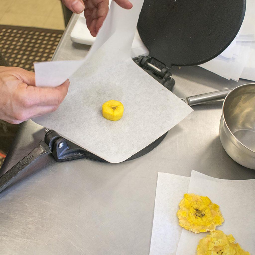 Place each chunk between two sheets of parchment paper and press down with a glass or heavy object to flatten to ¼” thickness. Peel off parchment